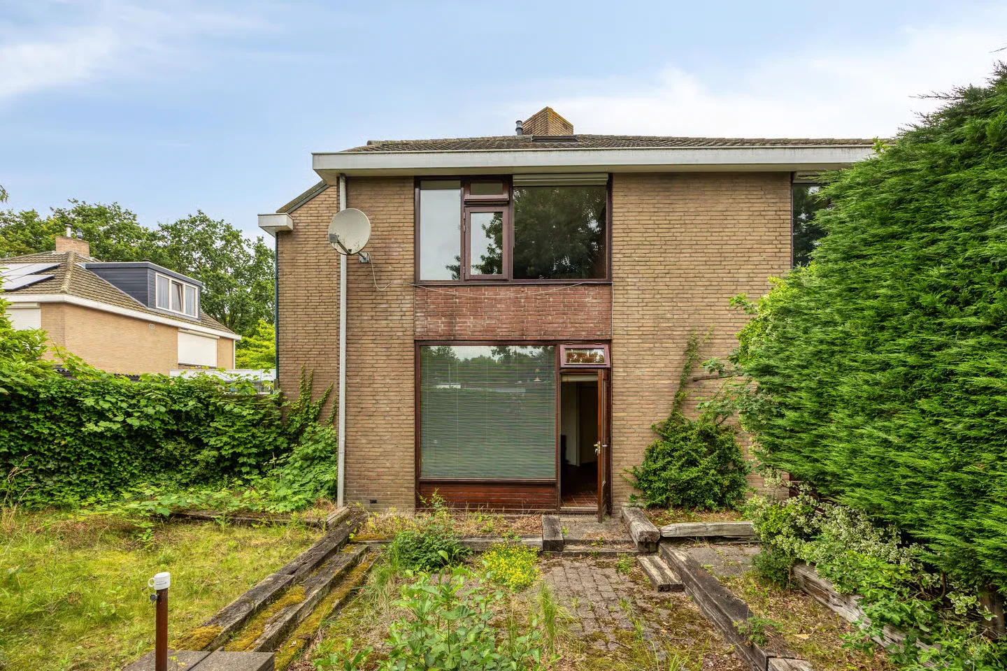 Achtergevel en tuin van Marjolein 6 in de huidige staat